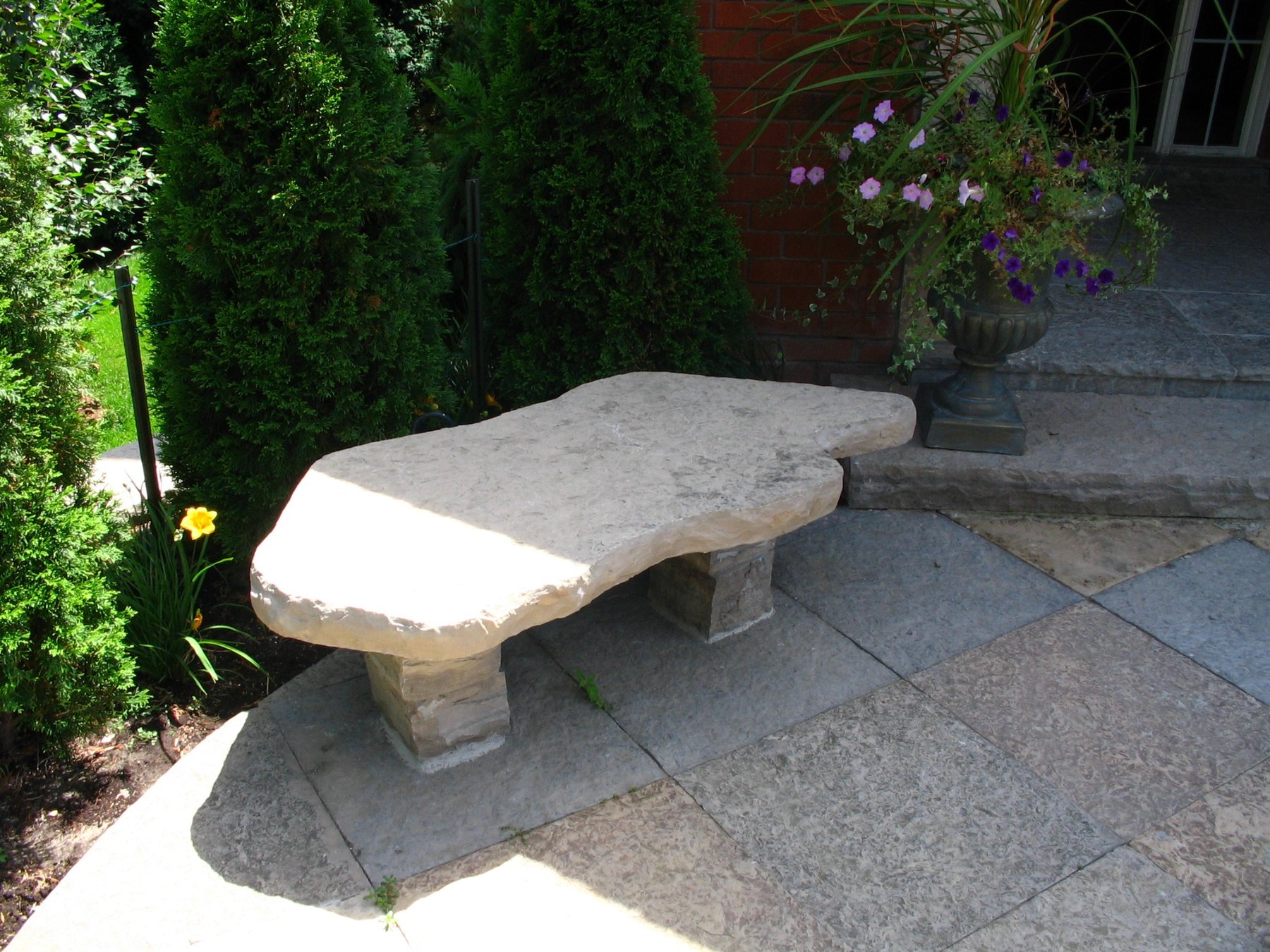 Stone steps framed by flowering plantings